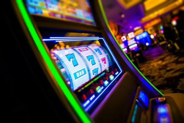 emon 77 Hood vs Wolf live dealer table on mobile phone screen with stake controls